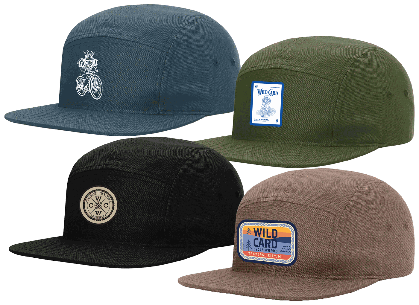 Four five-panel hats: three carrying earlier playing-card style Wild Card marks, and a brown hat wearing the new landscape patch